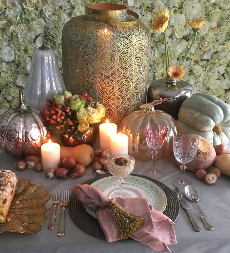 feminine fall tablescape featuring gold, pink, and turquoise accents