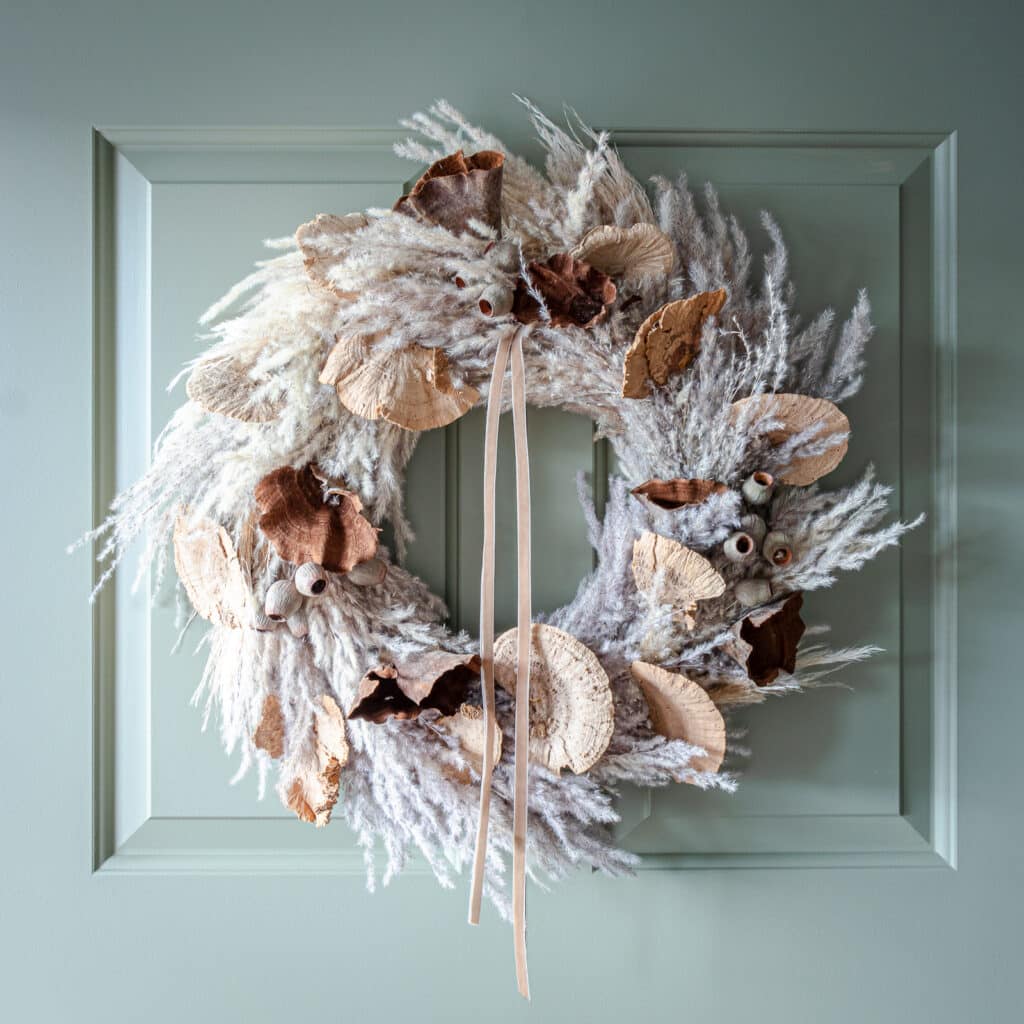 Mushroom wreath designed on a pampas base.